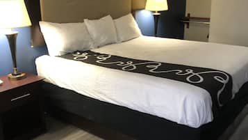 Habitación individual económica, 1 cama King size, con acceso para personas discapacitadas | Escritorio, cortinas blackout, wifi gratis y ropa de cama