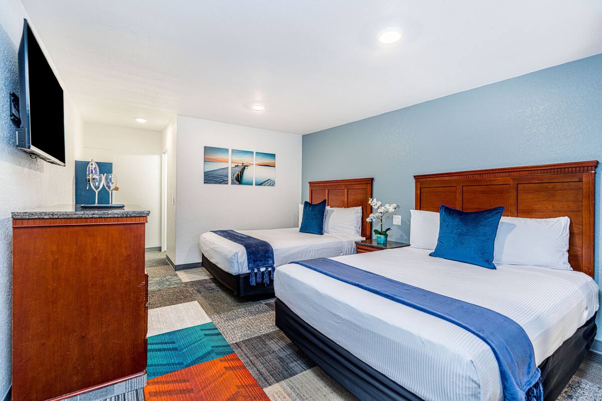 Standard Room, 2 Queen Beds | Pillowtop beds, in-room safe, blackout drapes