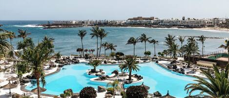 2 outdoor pools, pool umbrellas, pool loungers