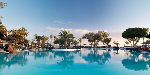 2 outdoor pools, pool umbrellas, sun loungers
