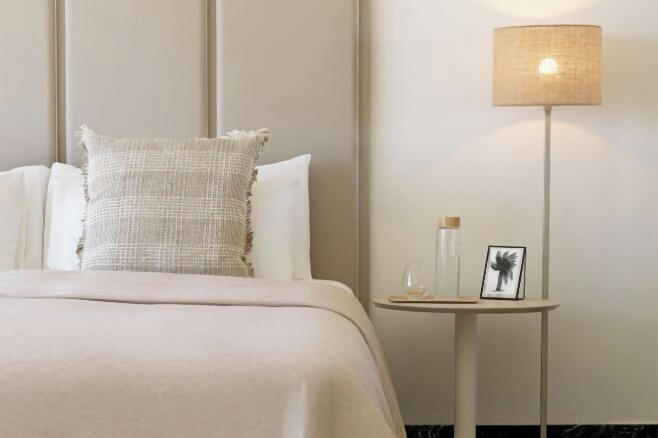 Premium bedding, down duvets, free minibar, blackout curtains