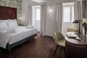 Premium bedding, down duvets, minibar, in-room safe