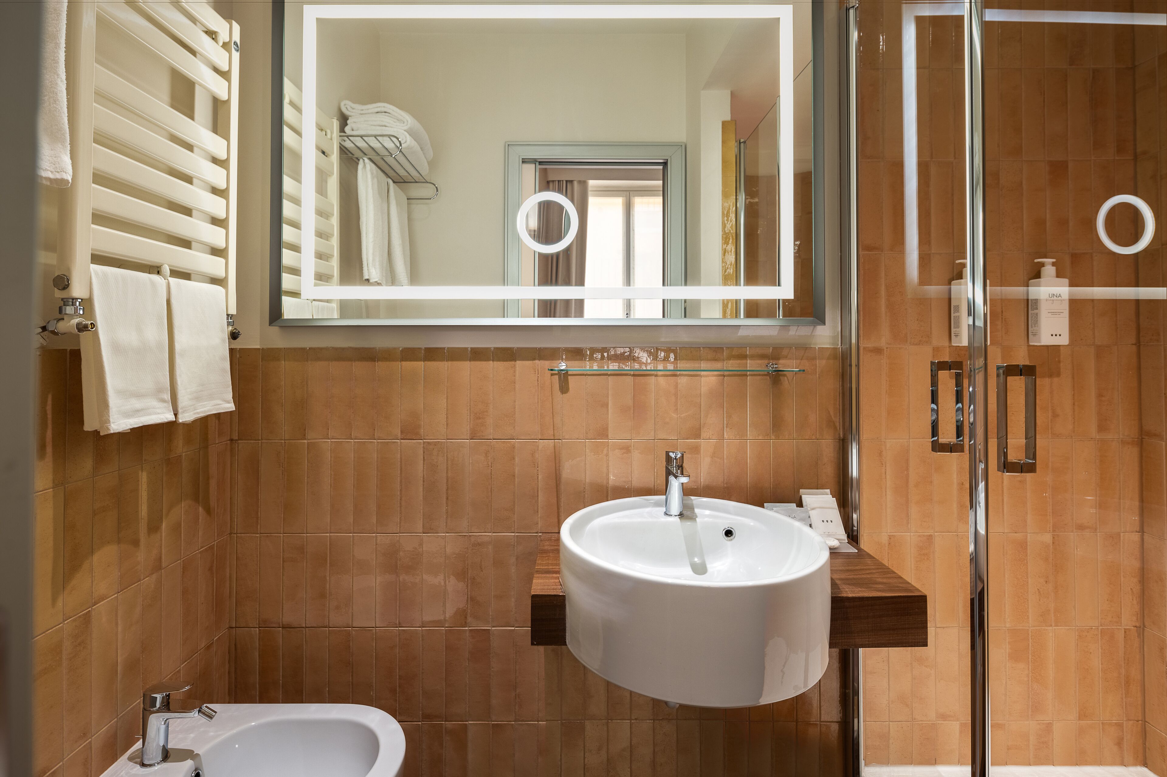 shower, designer toiletries, hair dryer, bathrobes