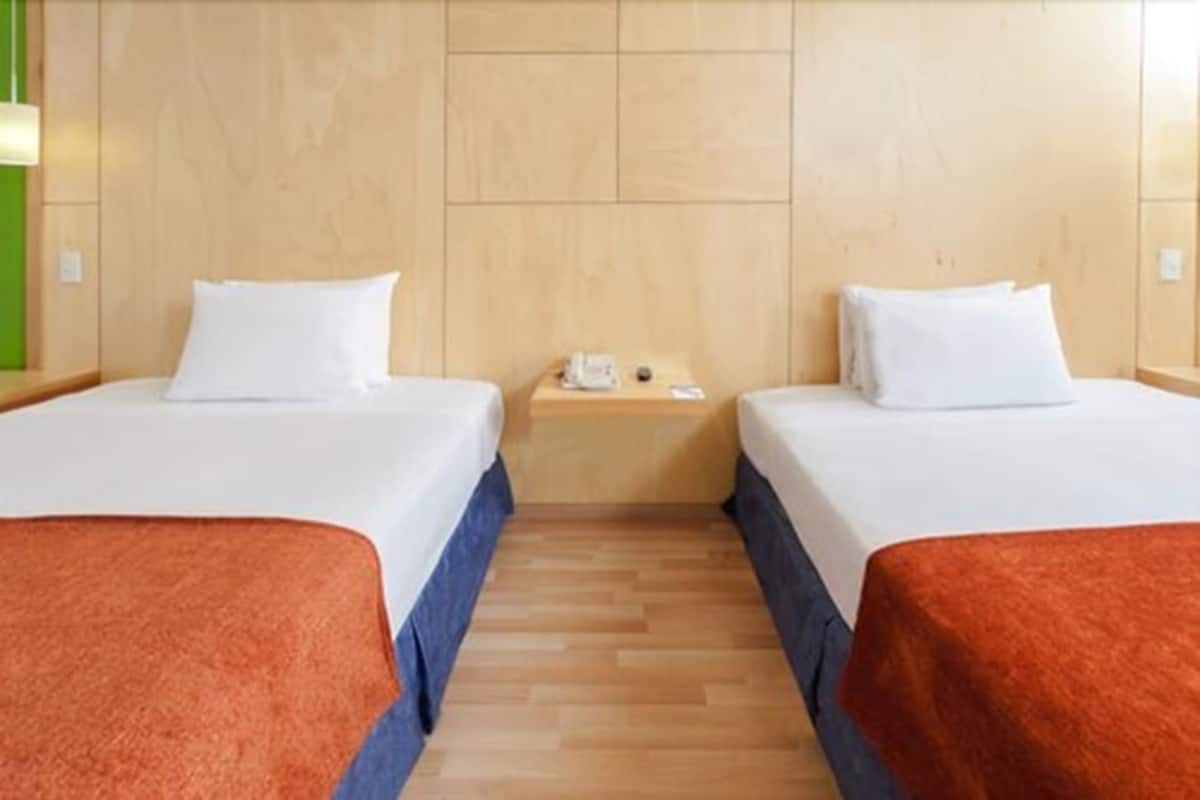 room, 2 queen beds, non smoking | premium bedding, down duvets, in-room safe, individually decorated