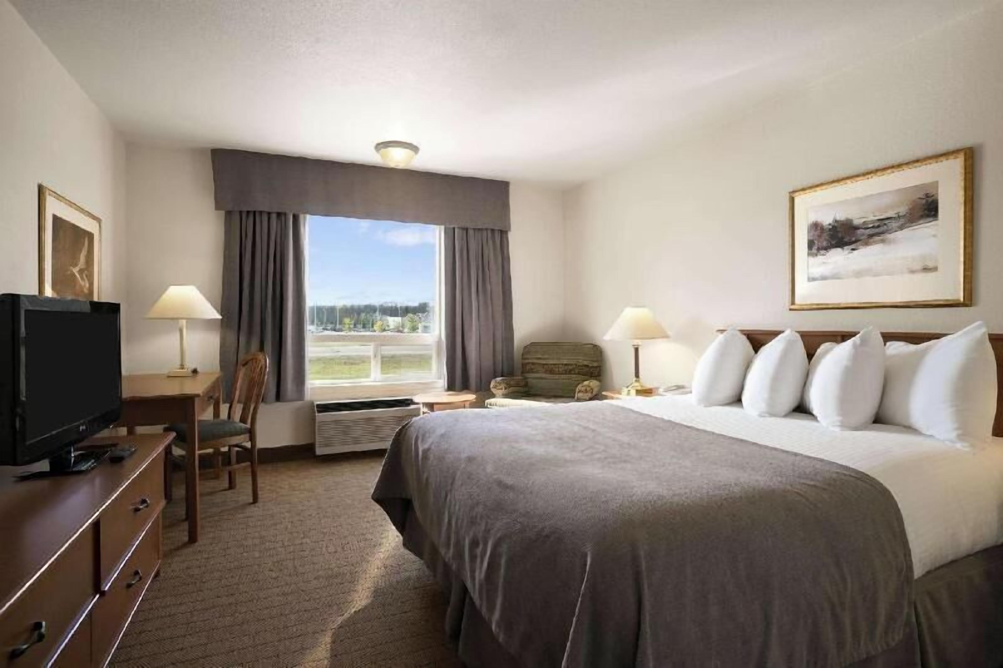 Premium bedding, blackout drapes, iron/ironing board, free WiFi