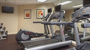 A gym with treadmills, ellipticals, and weight machines. - Residence Inn by Marriott St Louis Airport (Earth City)