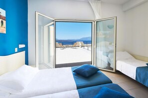 Superior Triple Room, Sea View | Minibar, in-room safe, desk, free cribs/infant beds