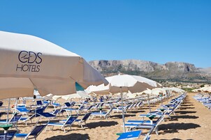 Private beach nearby, free beach shuttle, sun loungers, beach umbrellas