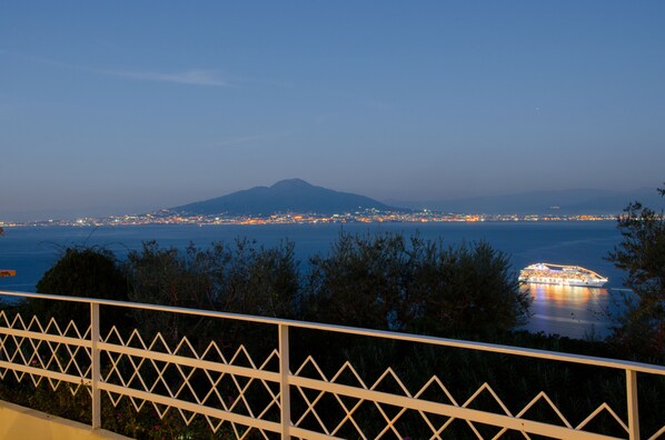 Enjoy breathtaking views of the city and surrounding mountains from this oceanfront balcony.