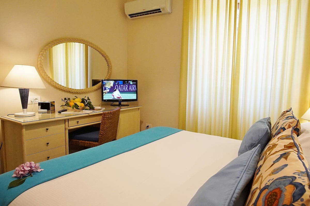 Economy Double or Twin Room (Annex - No View) | Minibar, in-room safe, desk, blackout drapes