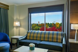 Riverview Balcony Executive King Suite Sleeper Sofa | Living area | Flat-screen TV