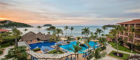 On the beach, beach shuttle, sun-loungers, beach umbrellas