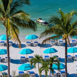 On the beach, white sand, beach towels, kayaking
