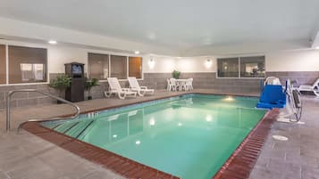 Indoor pool, open 10:00 AM to 9:00 PM, pool loungers