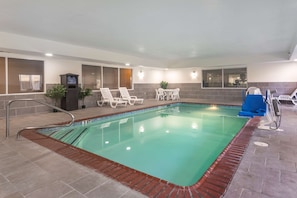 Indoor pool, open 10:00 AM to 9:00 PM, pool loungers