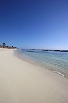 Private beach, white sand, beach umbrellas, beach towels