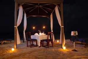 Breakfast, lunch, dinner served; beach views