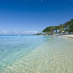 On the beach, white sand, free beach cabanas, sun-loungers