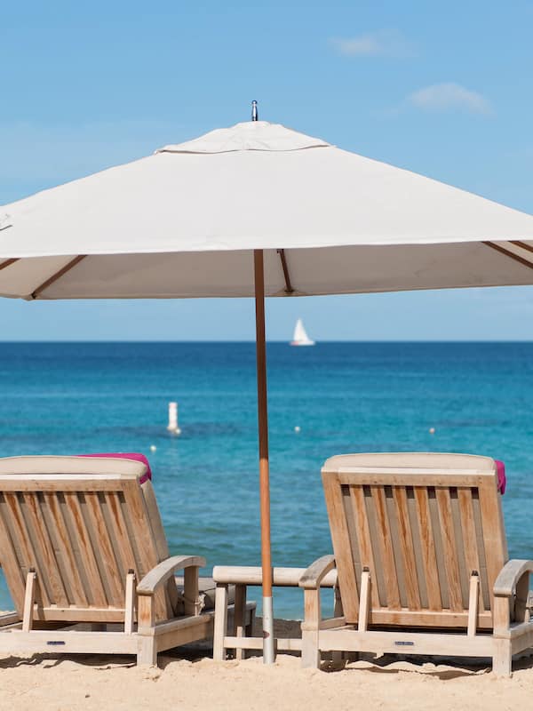 On the beach, white sand, free beach cabanas, sun loungers