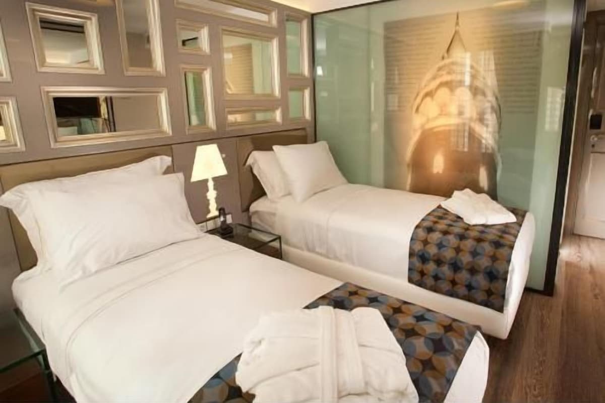 Premium bedding, memory foam beds, minibar, in-room safe