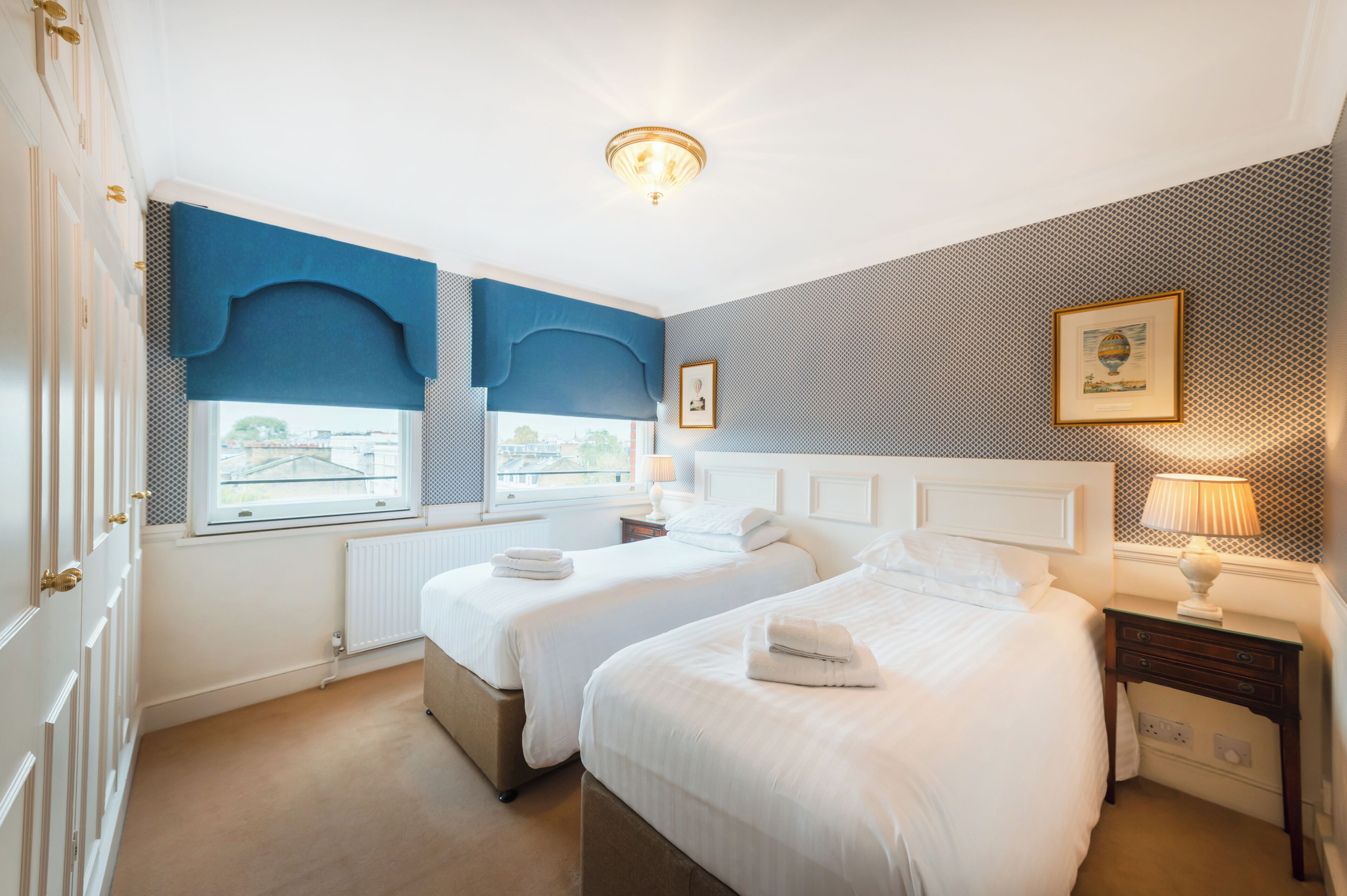 Apartemen Tradisional, 2 kamar tidur, 2 kamar mandi | Seprai premium, brankas, dan ruang kerja ramah laptop