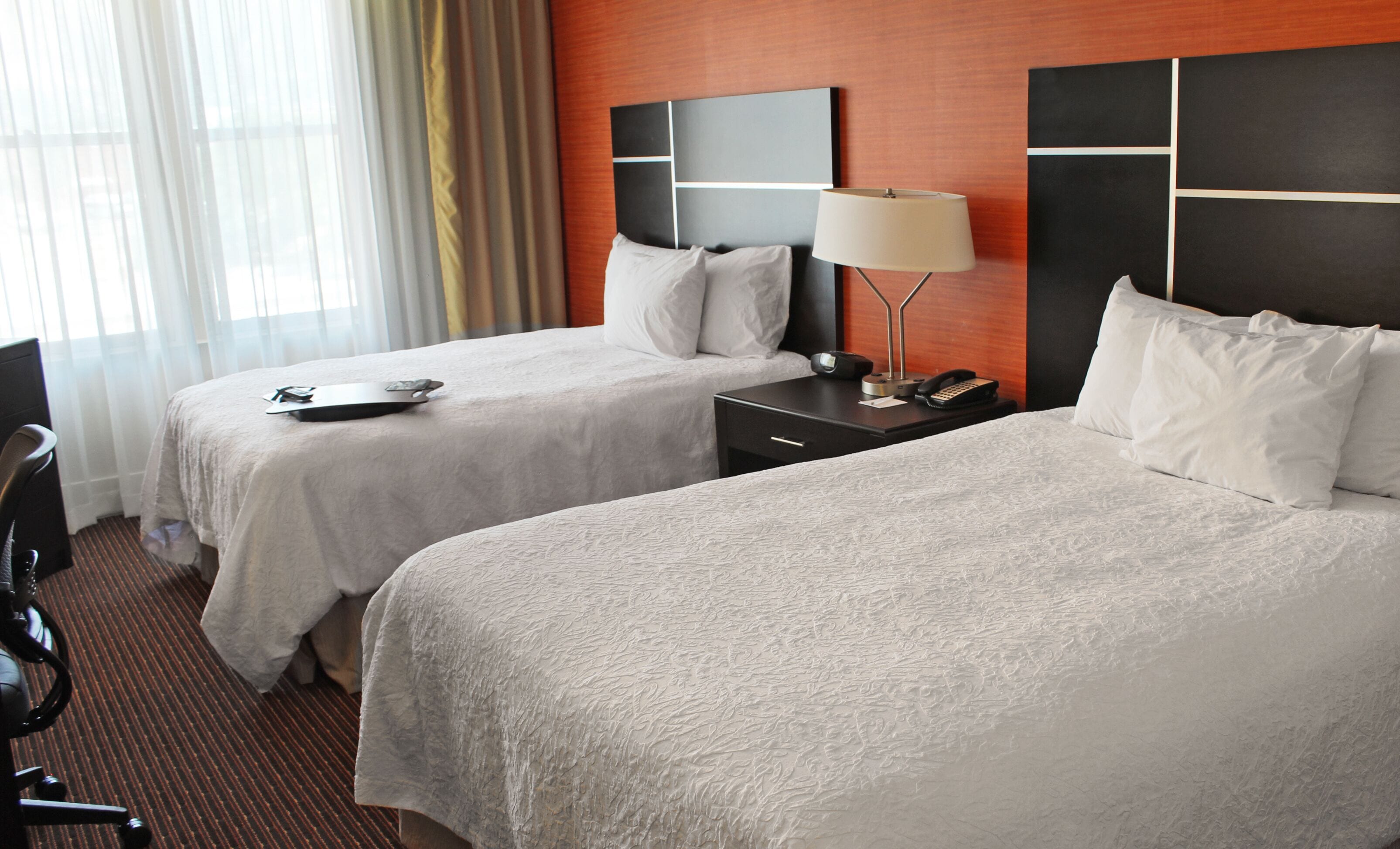 desk, laptop workspace, blackout curtains, iron/ironing board