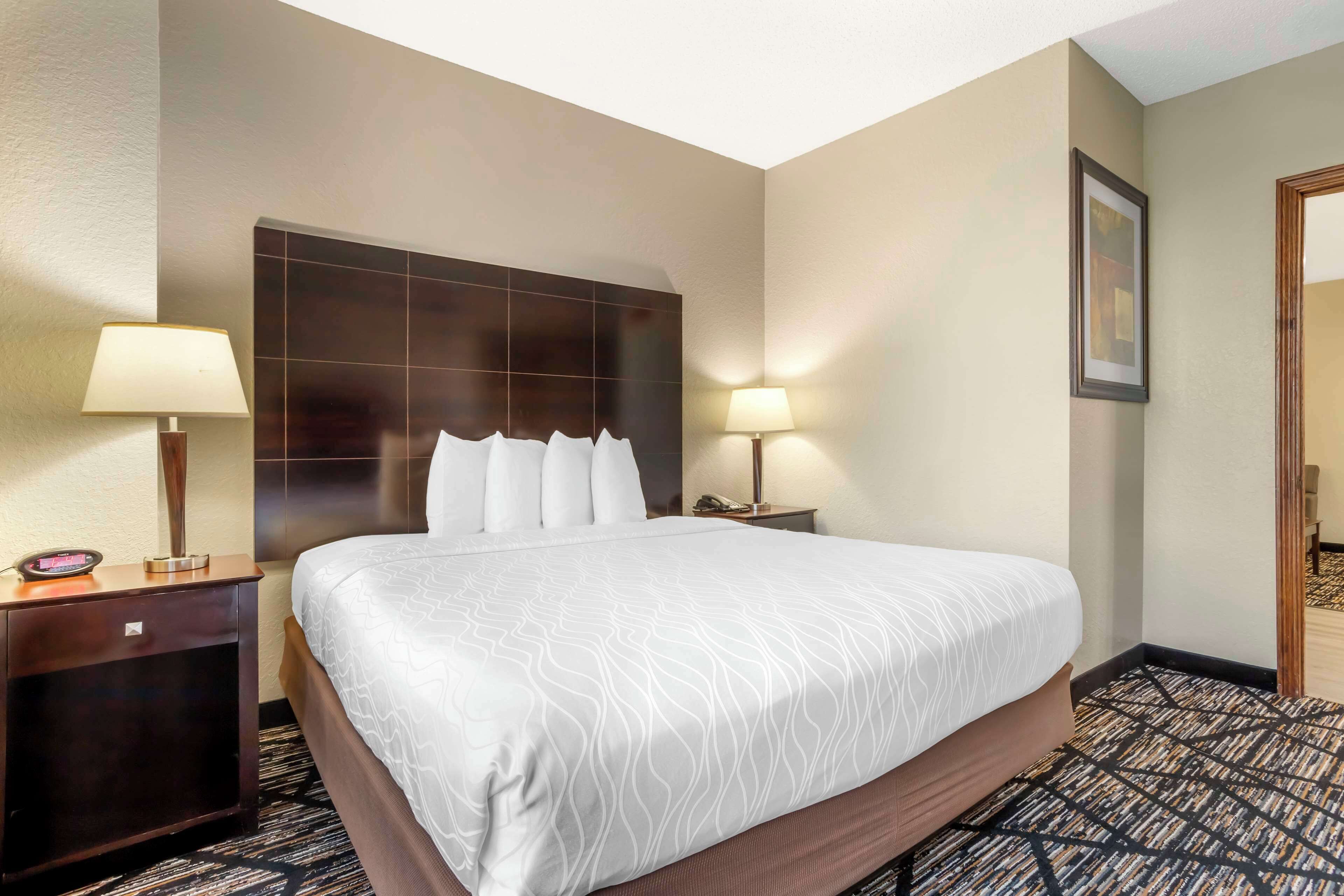 desk, laptop workspace, blackout curtains, iron/ironing board