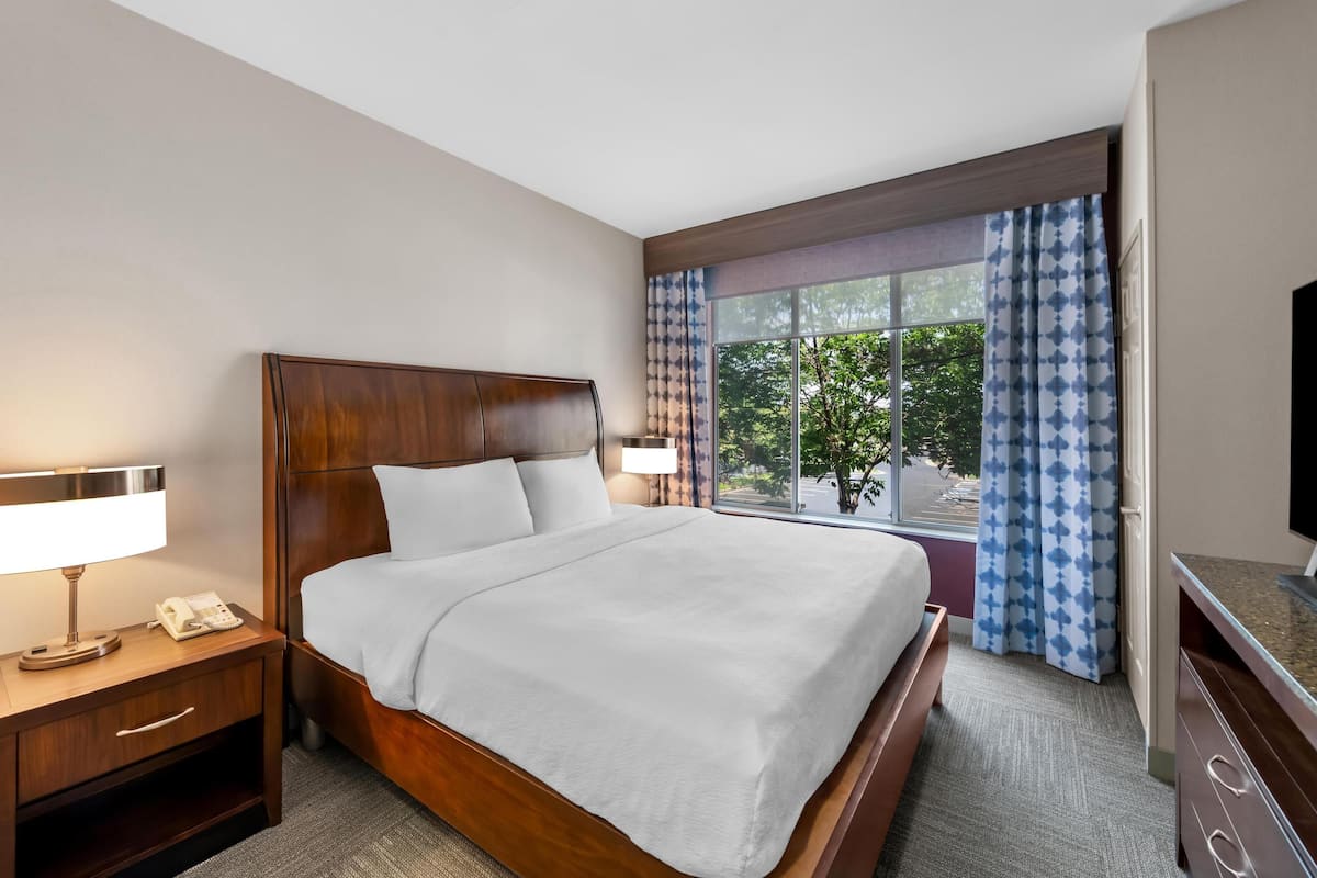 One king bed junior suite | Desk, blackout curtains, iron/ironing board, free rollaway beds