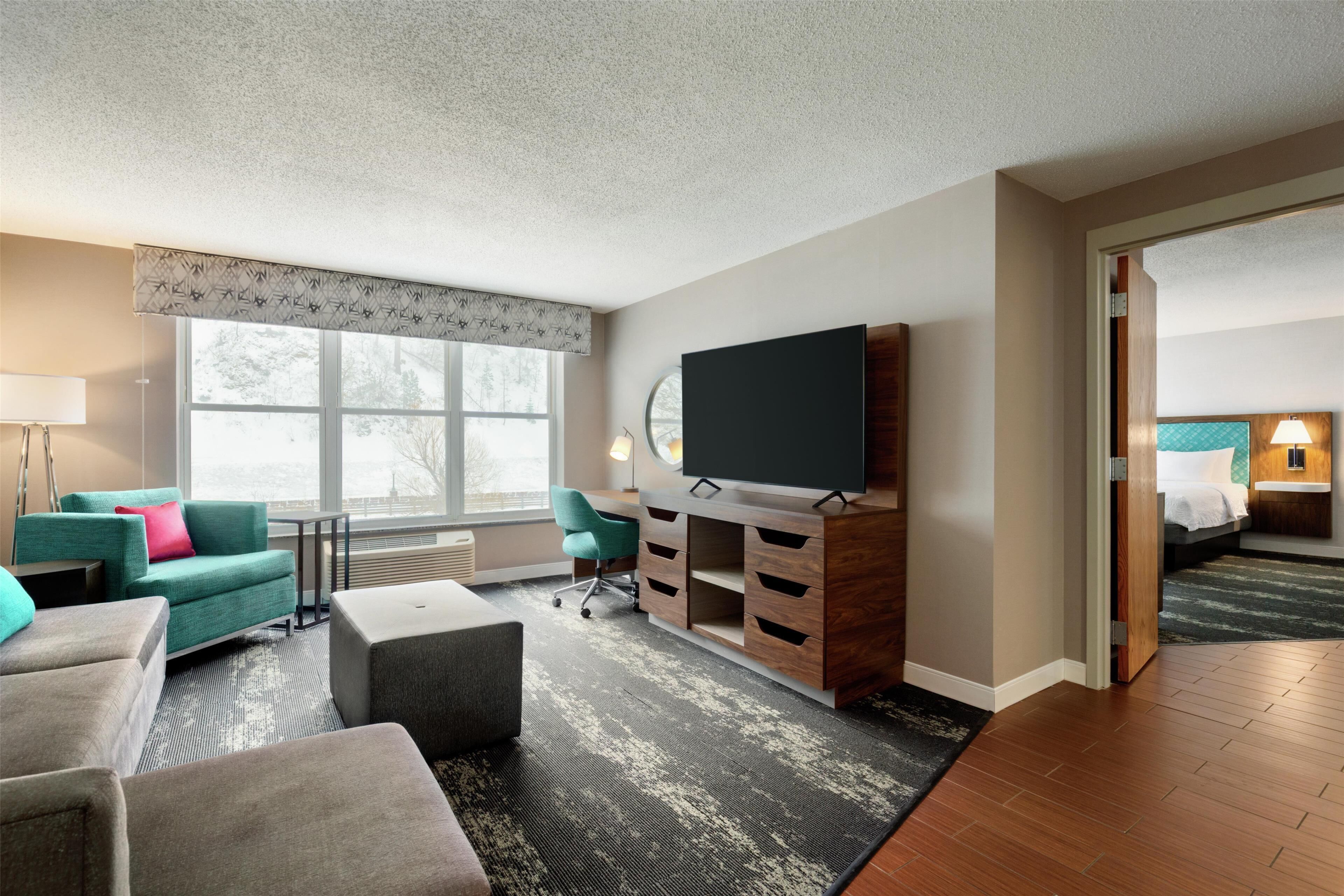 presidential suite, 1 king bed with sofa bed, jetted tub | living area | 55-inch lcd tv with digital channels, netflix, hulu