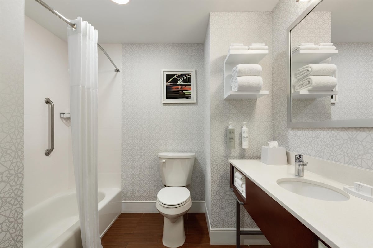 room, 2 queen beds, non smoking | bathroom | free toiletries, hair dryer, towels, soap