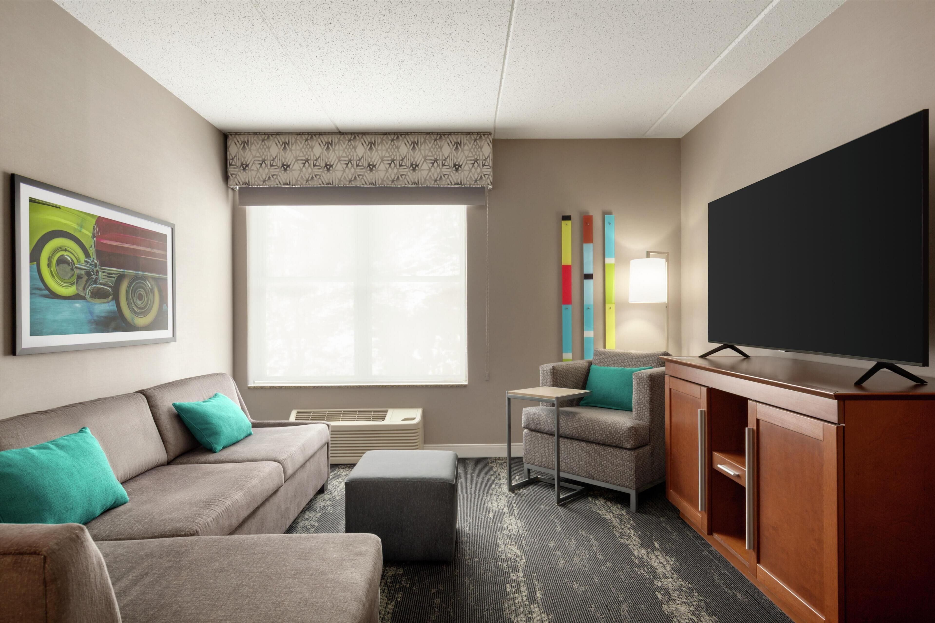 executive suite | living area | 55-inch lcd tv with digital channels, netflix, hulu