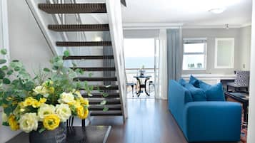 Penthouse, pemandangan laut | Area keluarga | TV LCD