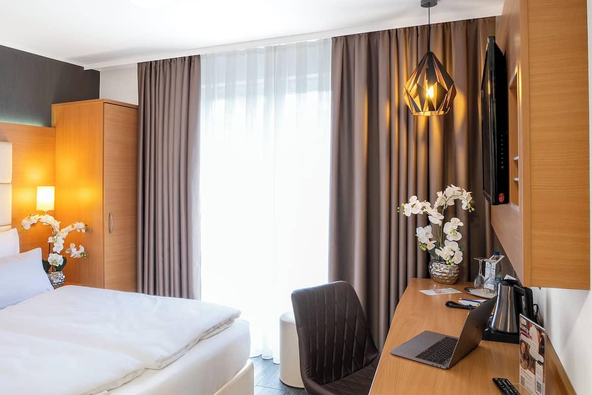 Hypo-allergenic bedding available, minibar, in-room safe, desk