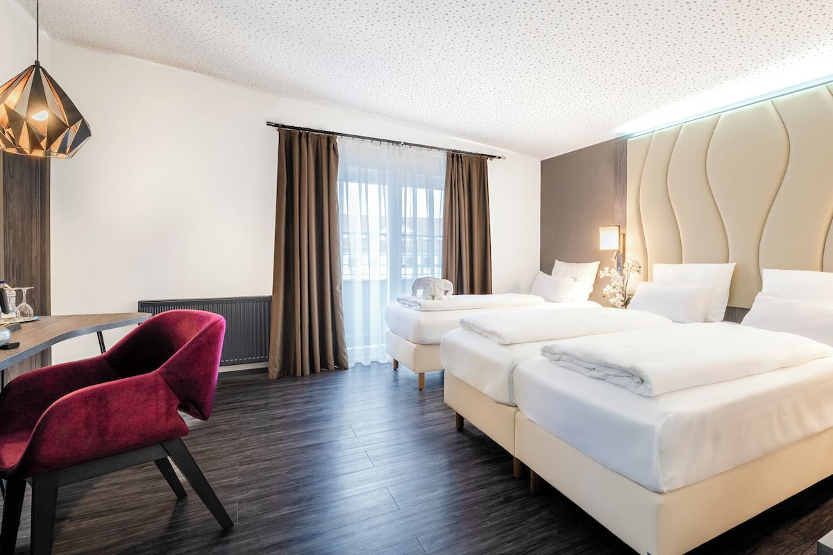 Premium Triple Room | Hypo-allergenic bedding available, minibar, in-room safe, desk