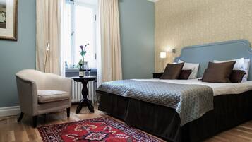 Double Room, Garden Area | Minibar, in-room safe, desk, blackout drapes