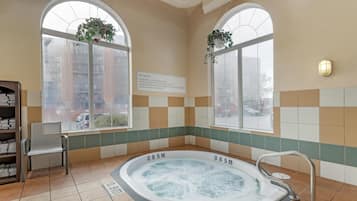 Indoor pool, open 8 AM to 11 PM, pool loungers