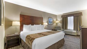 Hypo-allergenic bedding, laptop workspace, blackout curtains