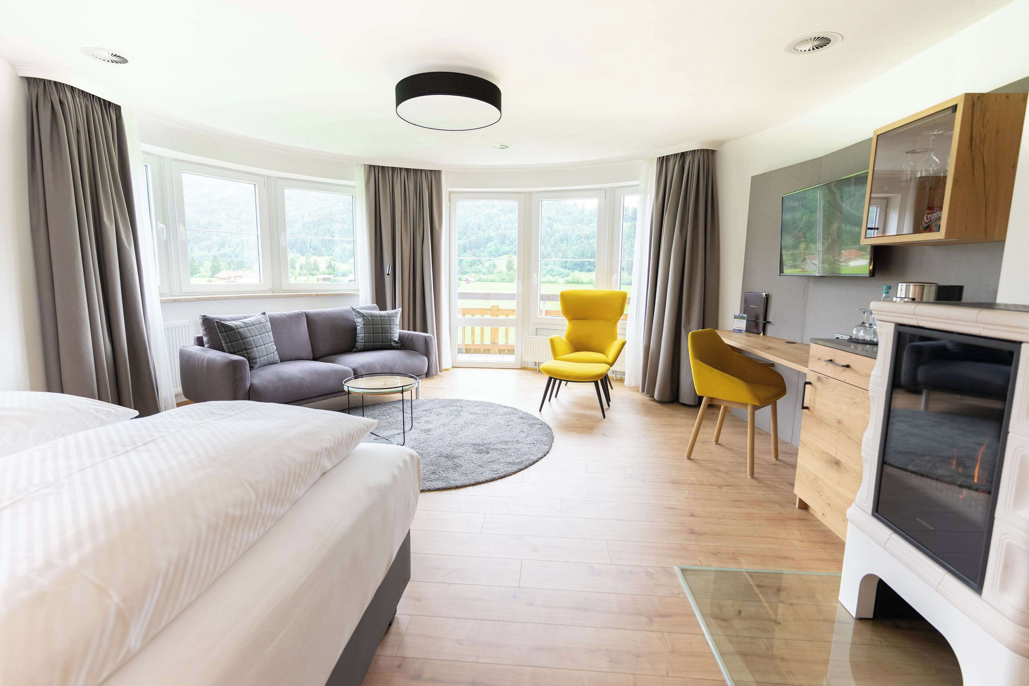 junior suite, 1 double bed, mountain view | in-room safe, desk, laptop workspace, blackout curtains