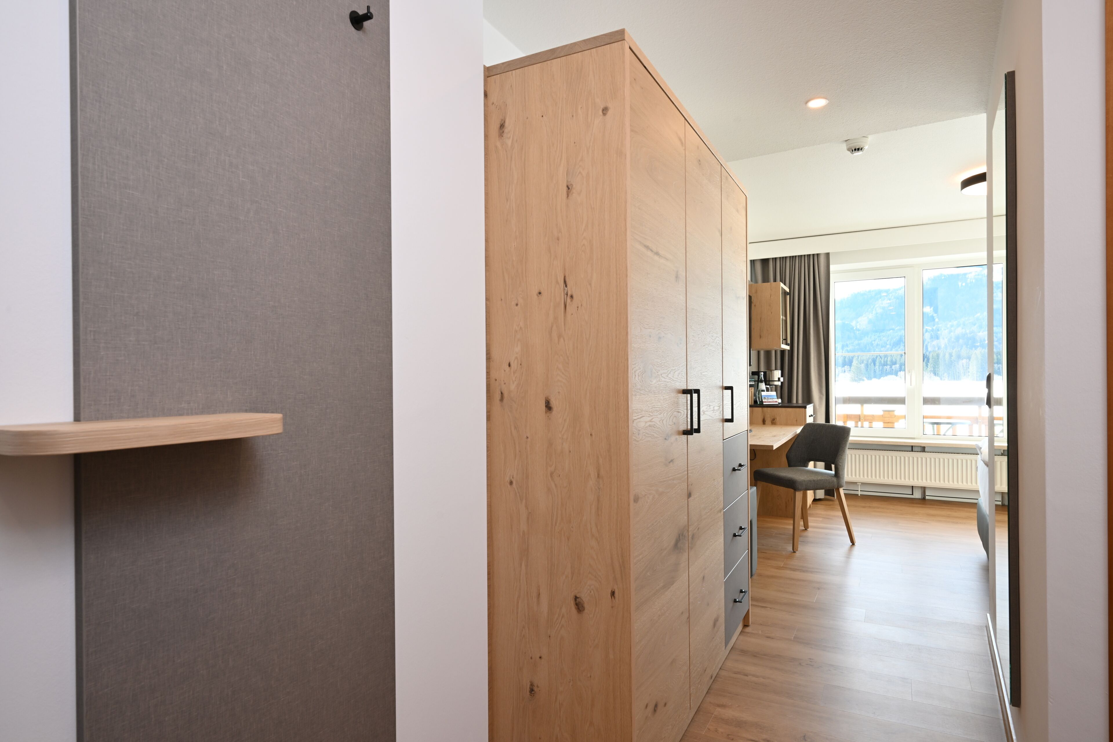 superior room, 1 single bed, balcony, mountain view | in-room safe, desk, laptop workspace, blackout curtains