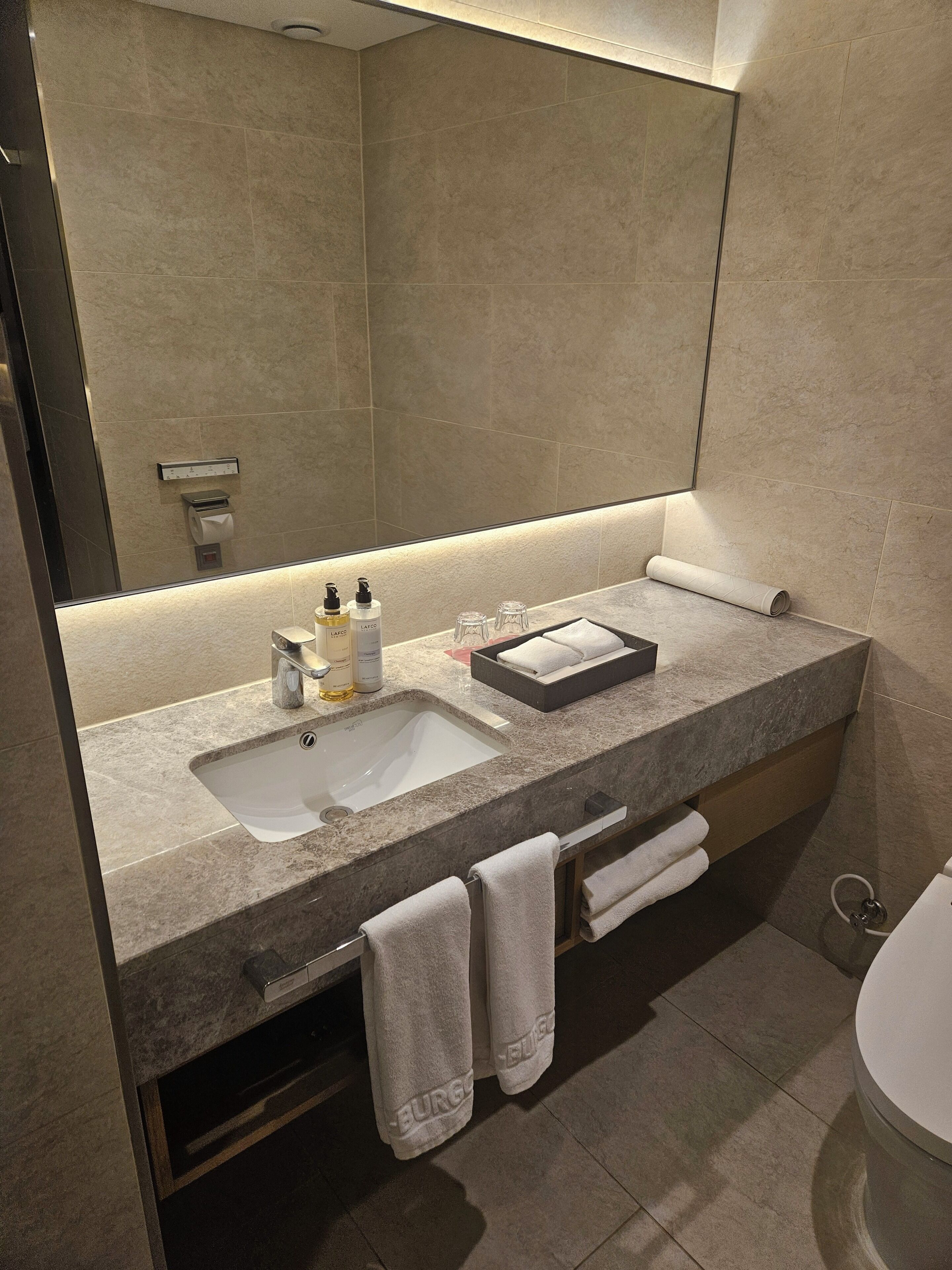 Hair dryer, bathrobes, slippers, towels