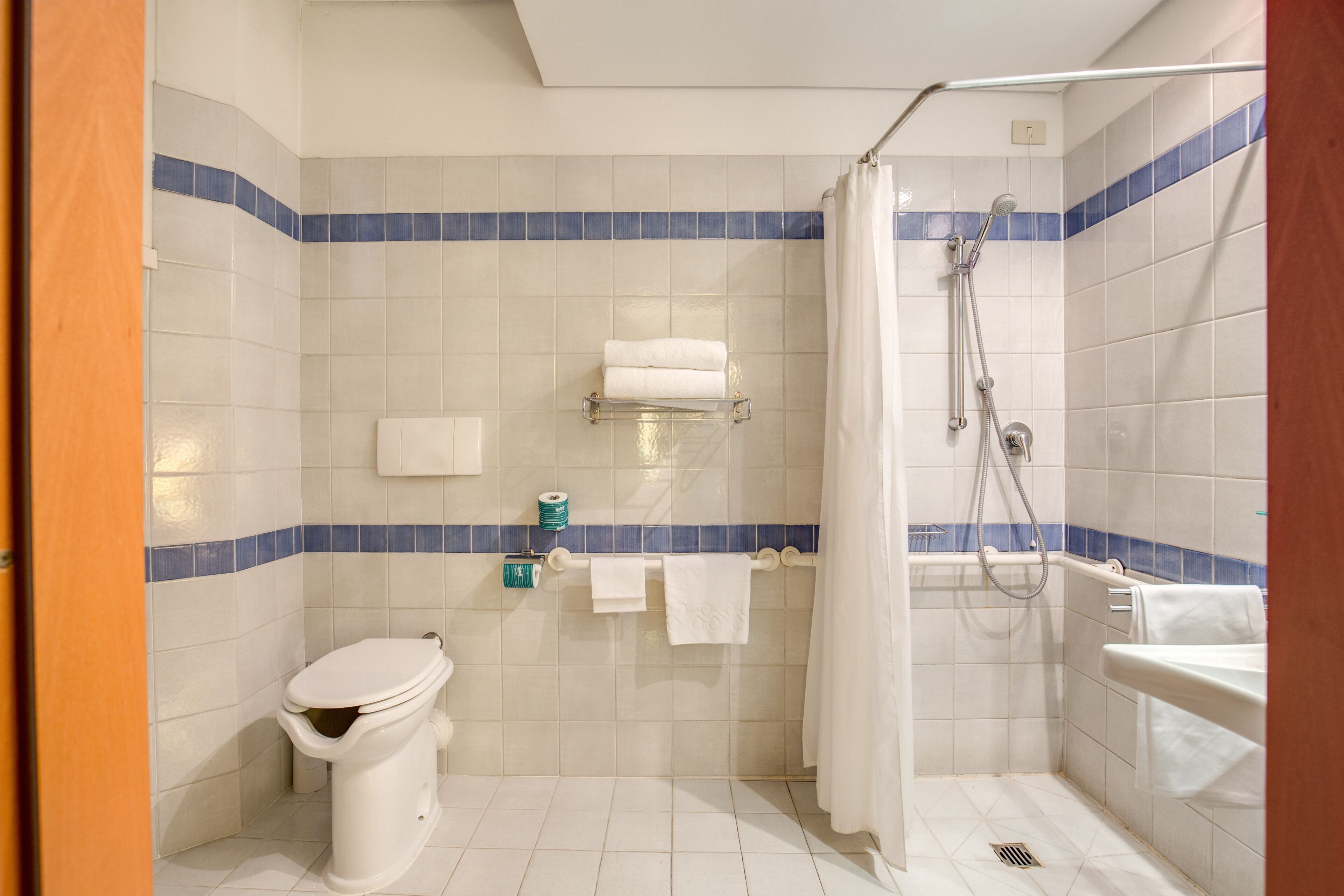 standard single room | bathroom | rainfall showerhead, eco-friendly toiletries, hair dryer, bidet