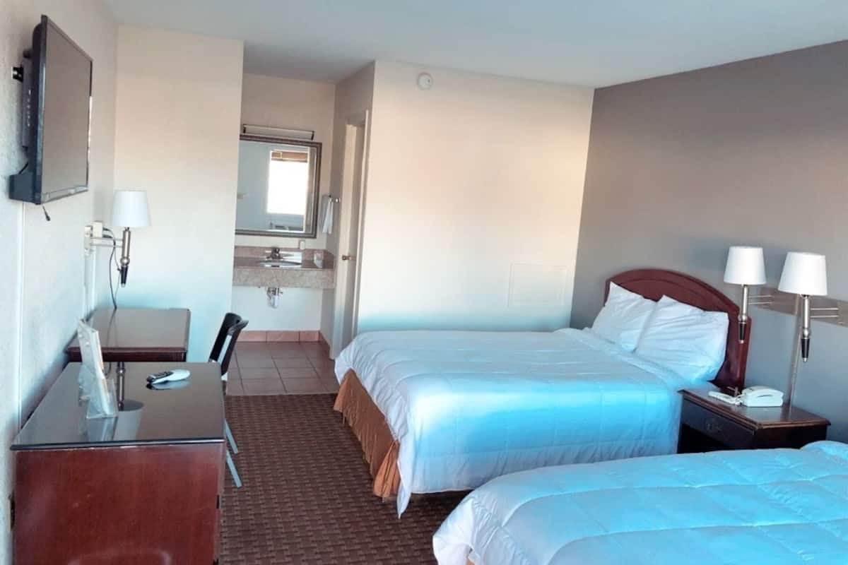 Desk, free WiFi, bed sheets, alarm clocks