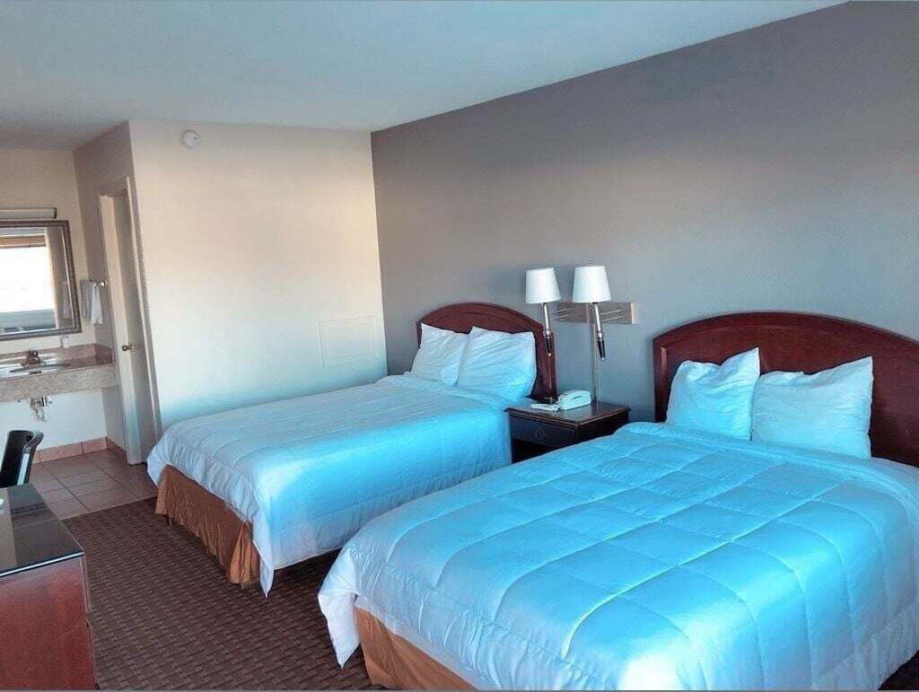 Desk, free WiFi, bed sheets, alarm clocks
