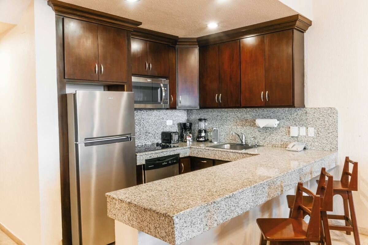 premium condo, 2 bedrooms, hot tub, sea view | private kitchen | fridge, microwave, stovetop, coffee/tea maker