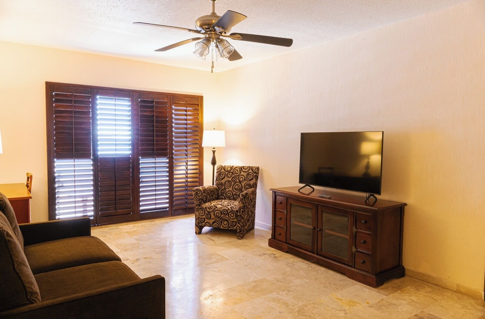 premium condo, 2 bedrooms, hot tub, sea view | living area | tv, dvd player, ipod dock