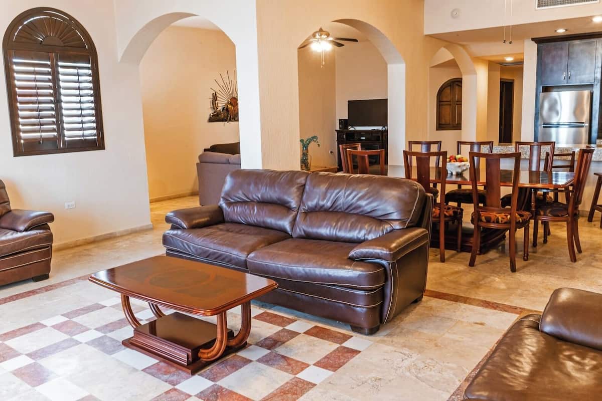 premium condo, 2 bedrooms, hot tub, sea view | living area | tv, dvd player, ipod dock