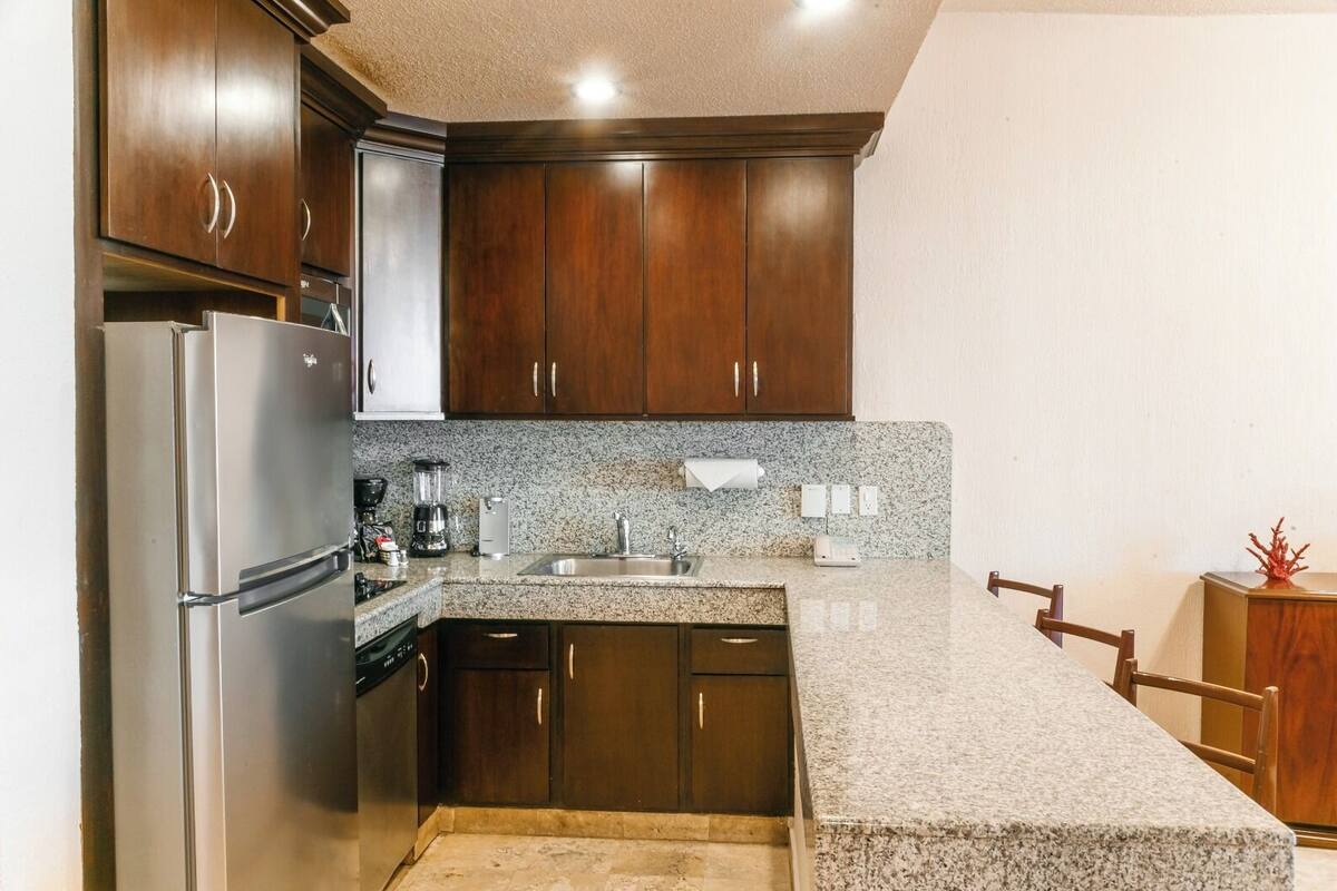 premium condo, 2 bedrooms, hot tub, sea view | private kitchen | fridge, microwave, stovetop, coffee/tea maker