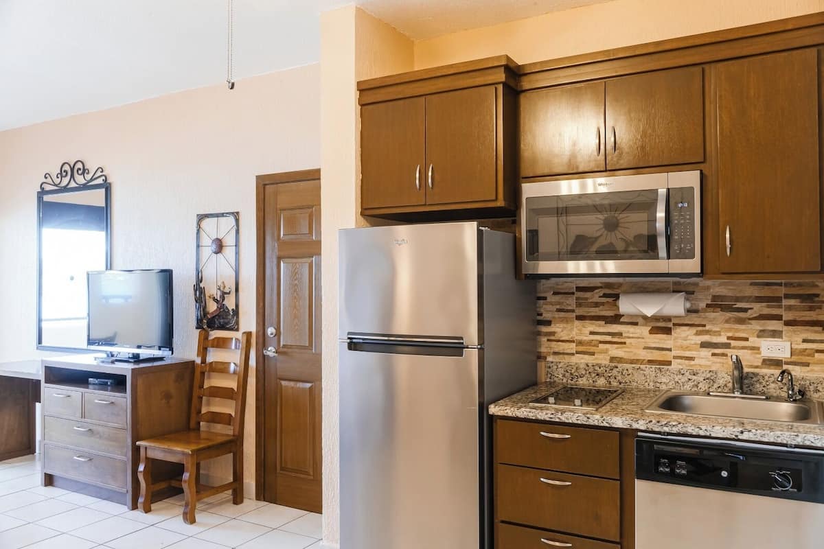 standard studio suite, 1 king bed, kitchenette | private kitchen | fridge, microwave, stovetop, coffee/tea maker