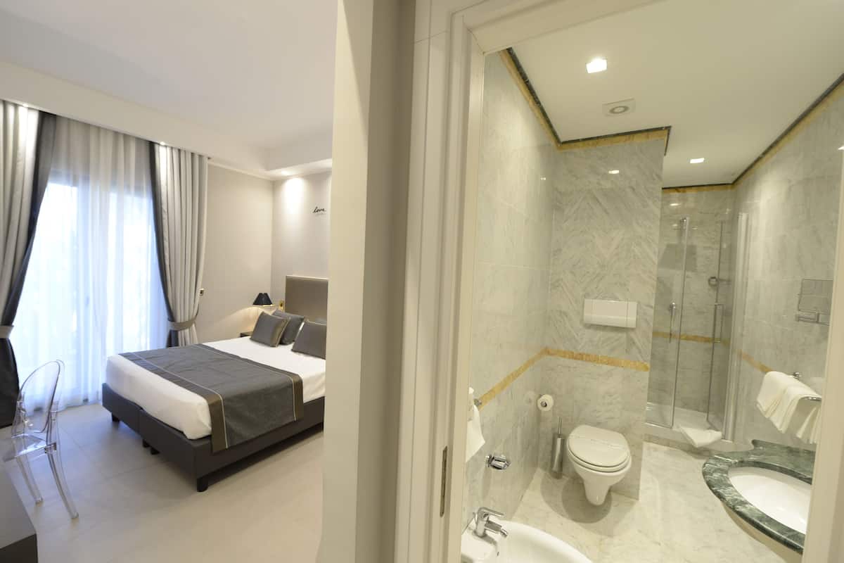 shower, free toiletries, hair dryer, slippers