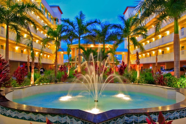 2 outdoor pools, open 9:00 AM to 10:00 PM, pool umbrellas, pool loungers